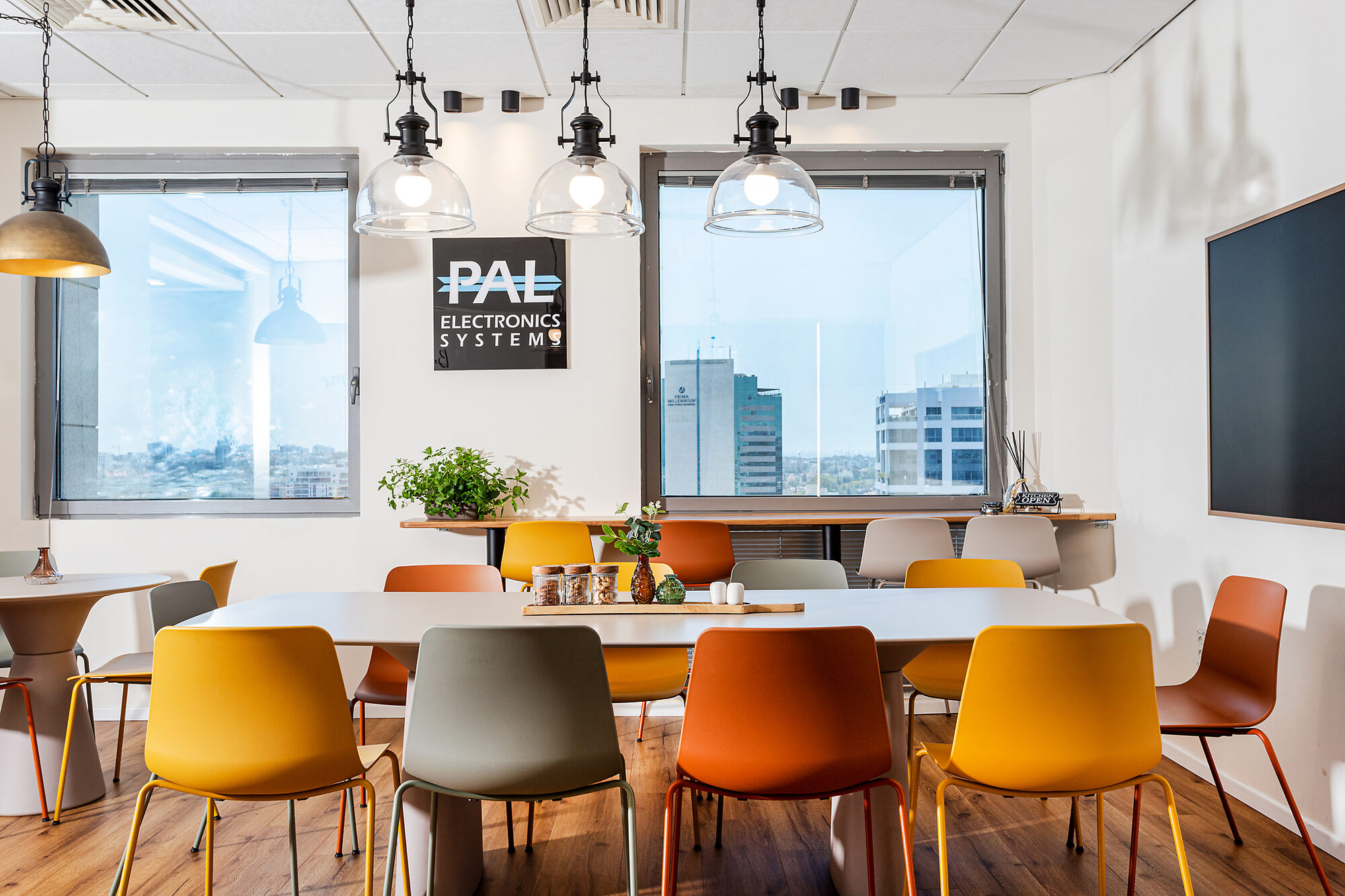 Meeting area at the PAL office with city views